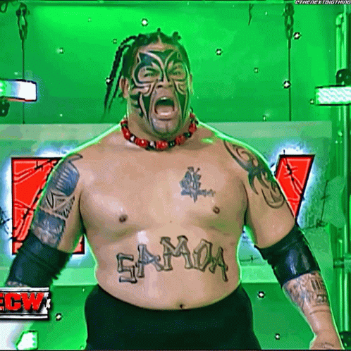 A Wrestler With A Tattoo On His Chest That Says Samoa GIF