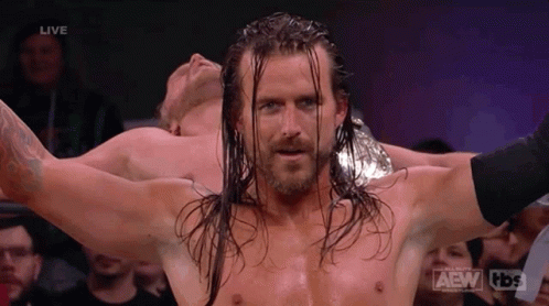 Wrestler With Long Hair And Beard Arms Outstretched GIF