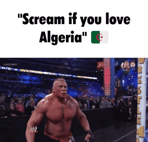 A Wrestler With The Words " Scream If You Love Algeria " On Top Of Him GIF