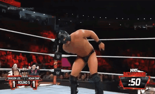 A Wrestling Match Between Dragon Lee And Noam Bar Is Going On GIF