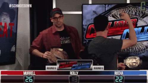A Wrestling Match Between Murrell And Reilly Is Going On GIF