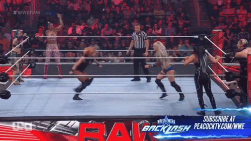 A Wrestling Match Is Being Broadcasted On Peacock Tv GIF
