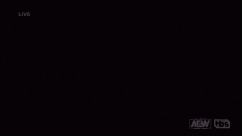 A Wrestling Match Is Being Shown Live On A Tbs Network GIF