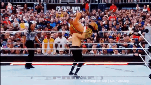 A Wrestling Match Is Being Shown On Tv With The Words Cleveland In The Corner GIF