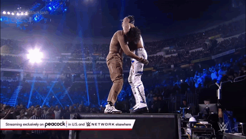 A Wrestling Match Is Being Streamed On Peacock In U.s. And Network Elsewhere GIF