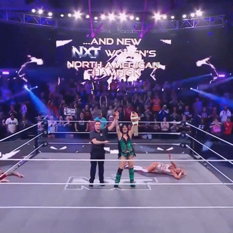 A Wrestling Ring With The Words " And New Nxt Women 'S North American Champion " On It GIF
