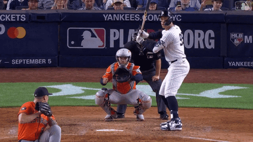 A Yankees Baseball Player Getting Ready To Swing His Bat GIF