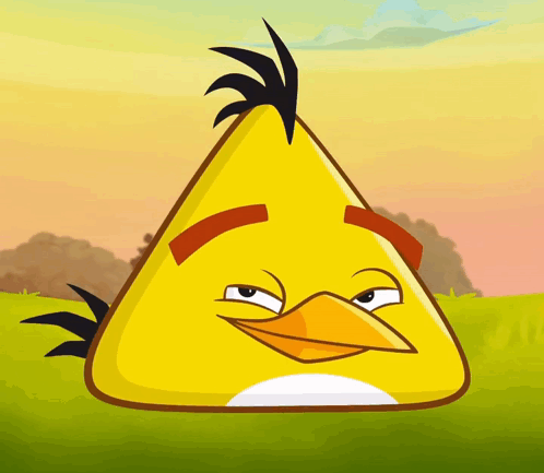 A Yellow Angry Bird With A Black Feather On Its Head Is Making A Funny Face GIF