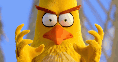 A Yellow Angry Bird With A Red Beak Making A Funny Face GIF