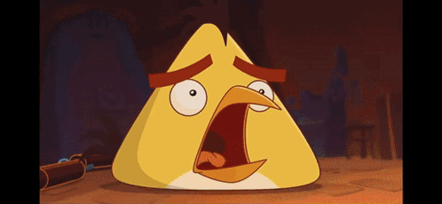 A Yellow Angry Bird With A Surprised Expression On Its Face GIF