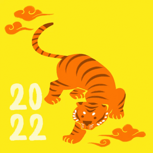 A Yellow Background With A Tiger And The Year Of The Tiger Written On It GIF