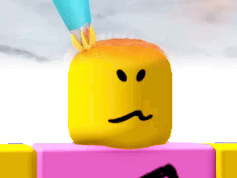 A Yellow Block With A Sad Face Is Being Painted By A Blue Brush GIF
