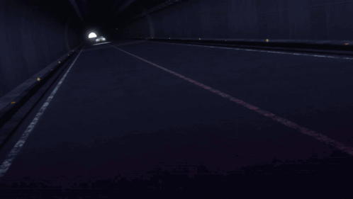 A Yellow Car With A License Plate That Says ' A ' On It Is Driving Through A Dark Tunnel GIF