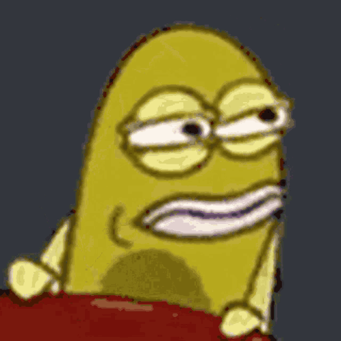 Yellow Cartoon Character With Glasses Sitting On Table GIF