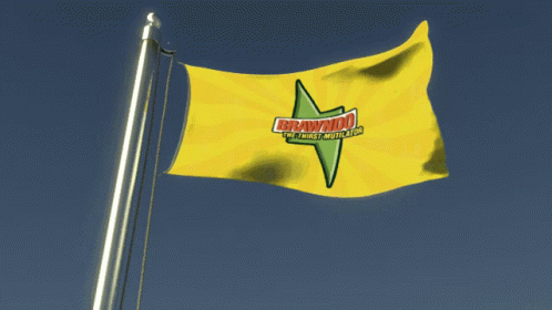 A Yellow Flag With Brawndo On It Is Flying In The Wind GIF