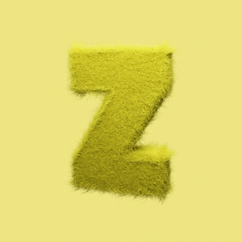 A Yellow Furry Letter Z Is On A Yellow Background GIF