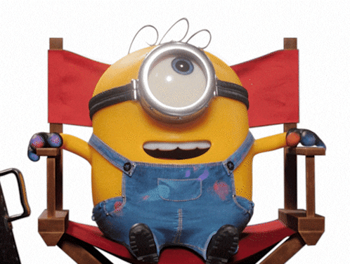 a yellow minion is sitting in a red directors chair