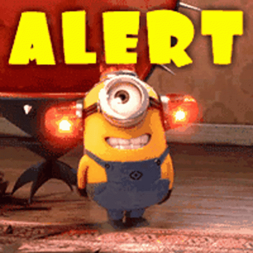 A Yellow Minion Is Standing In Front Of A Sign That Says " Alert " GIF