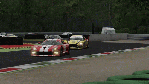 A Yellow Race Car With Sks Ag On The Side GIF