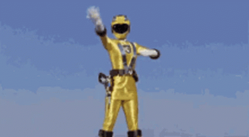 A Yellow Ranger With The Number 3 On His Chest GIF