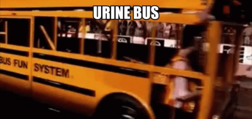 A Yellow School Bus With The Words `` Urine Bus '' Written On It Is Driving Down The Street . GIF