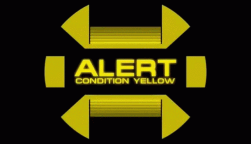 A Yellow Sign With The Words Alert Condition Yellow On It GIF