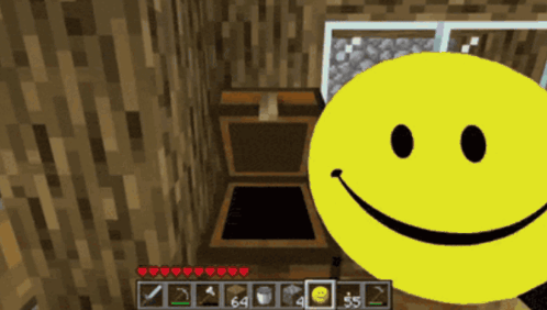 A Yellow Smiley Face Is In Front Of A Wooden Chest In A Video Game GIF