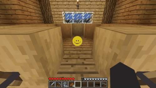 A Yellow Smiley Face Is In The Middle Of A Minecraft Game GIF