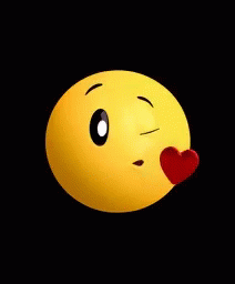 A Yellow Smiley Face With A Red Heart Behind It . GIF
