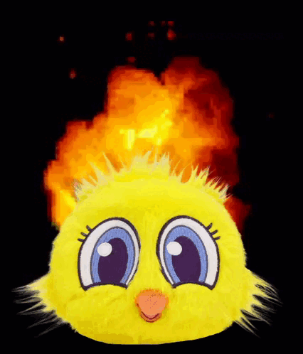 A Yellow Stuffed Animal With Blue Eyes And A Pink Nose Is On Fire GIF