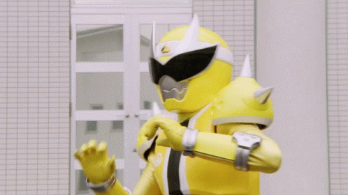 A Yellow Superhero Is Giving The Thumbs Up Sign GIF