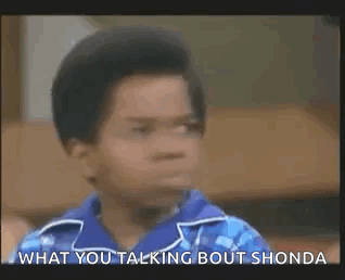 Boy In Blue Shirt Talking To Someone GIF
