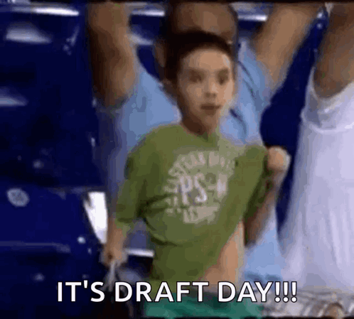 A Young Boy In A Green Shirt Says It 'S Draft Day !! GIF