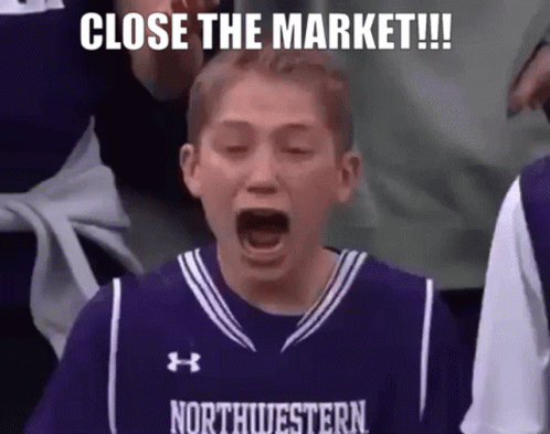 A Young Boy In A Purple Basketball Jersey Is Screaming While Watching A Basketball Game . GIF