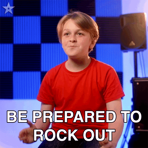 A Young Boy In A Red Shirt Is Prepared To Rock Out GIF