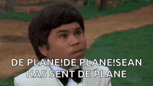 A Young Boy In A Tuxedo And Bow Tie Says De Plane De Plane Sean Has Sent De Plane . GIF