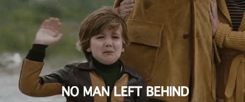 A Young Boy Is Crying While Standing Next To A Woman And Waving . GIF