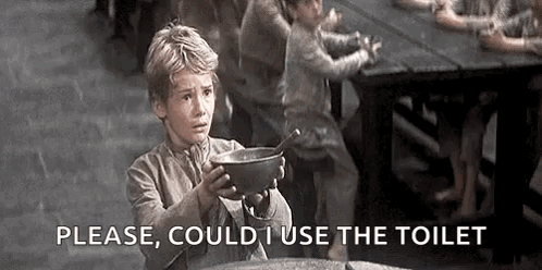 A Young Boy Is Holding A Bowl Of Food And Asking For A Toilet . GIF