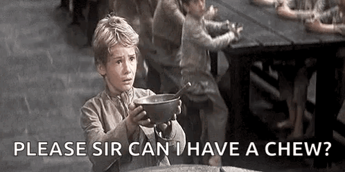 A Young Boy Is Holding A Bowl With A Spoon In It And Asking If He Can Have A Chew . GIF