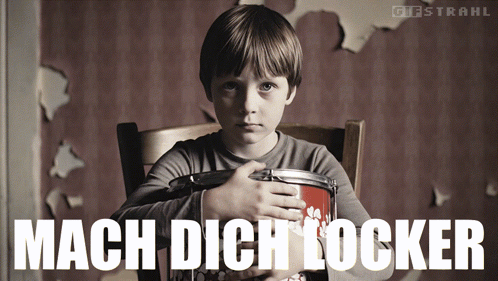 A Young Boy Is Holding A Drum With The Words Mach Dich Locker Written Below Him GIF