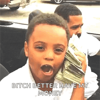 A Young Boy Is Holding A Stack Of Money In His Mouth And Making A Funny Face . GIF
