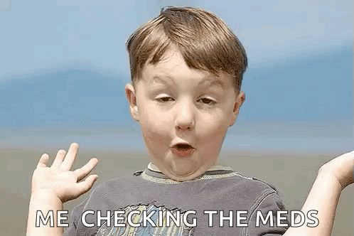A Young Boy Is Making A Funny Face And Saying `` Me Checking The Meds '' While Standing On A Beach . GIF
