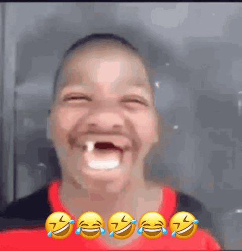 a young boy is making a funny face with tears in his eyes