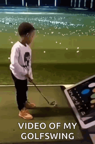 A Young Boy Is Playing Golf With A Video Of His Golf Swing In The Background GIF