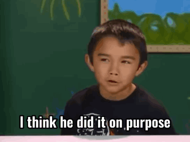 A Young Boy Is Sitting At A Table And Says I Think He Did It On Purpose GIF