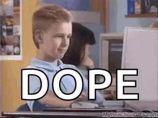 A Young Boy Is Sitting In Front Of A Computer With The Word Dope Written On It . GIF