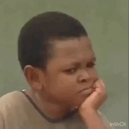 A Young Boy Is Sitting On A Cooler With His Hands Folded . GIF