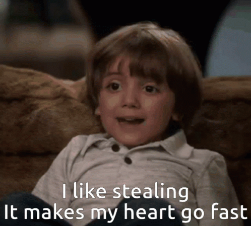 A Young Boy Is Sitting On A Couch With The Words " I Like Stealing It Makes My Heart Go Fast " GIF