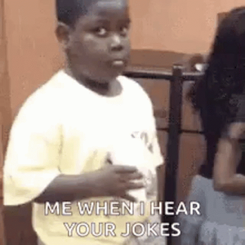 A Young Boy Is Standing In Front Of A Woman And Holding A Bottle Of Milk . GIF