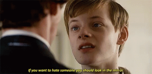 A Young Boy Is Talking To A Man In A Suit And Says `` If You Want To Hate Someone You Should Look In The Mirror . GIF